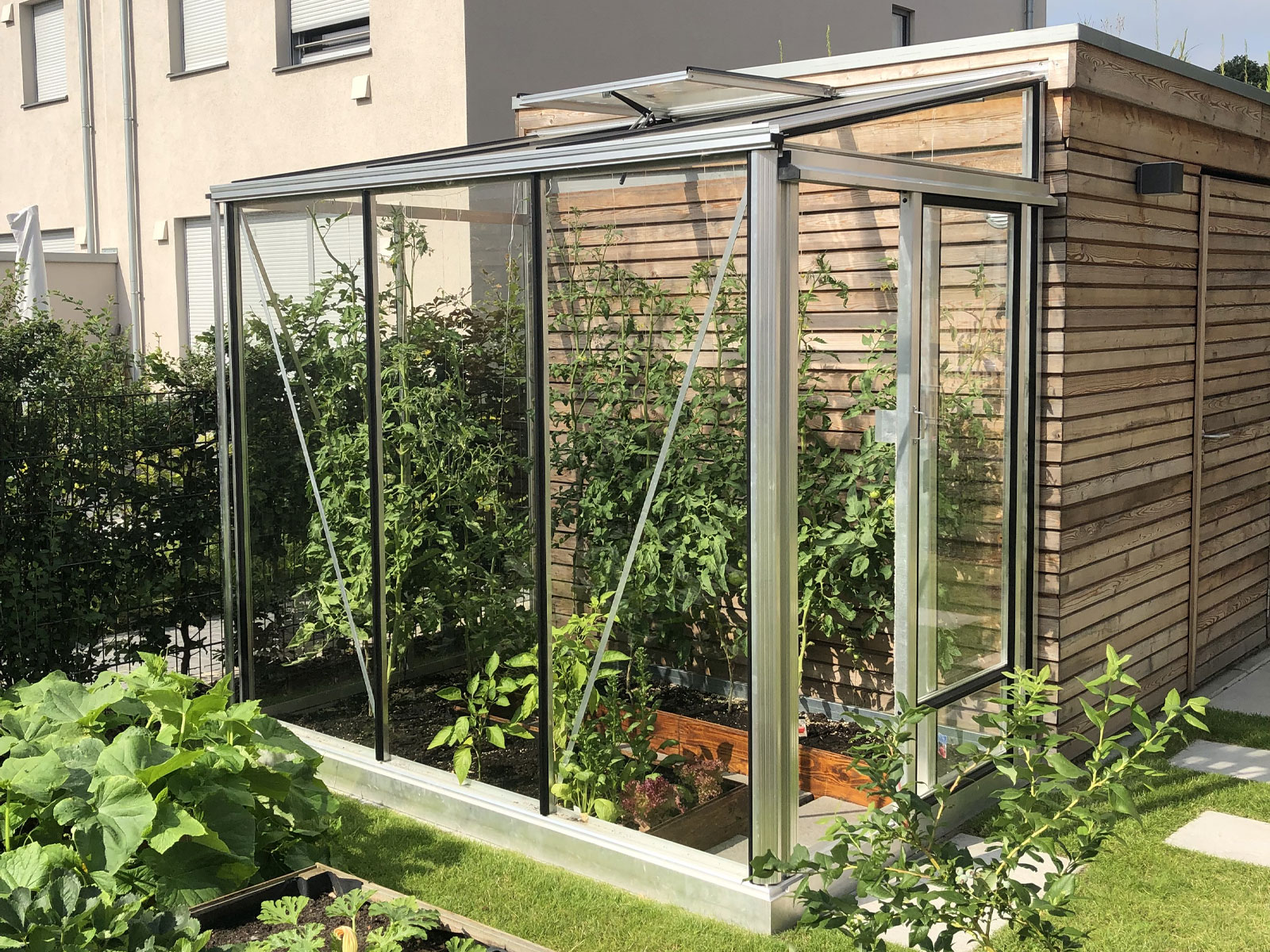 MURUS siltnamis stiklinis priesienis Gardenis.jpg